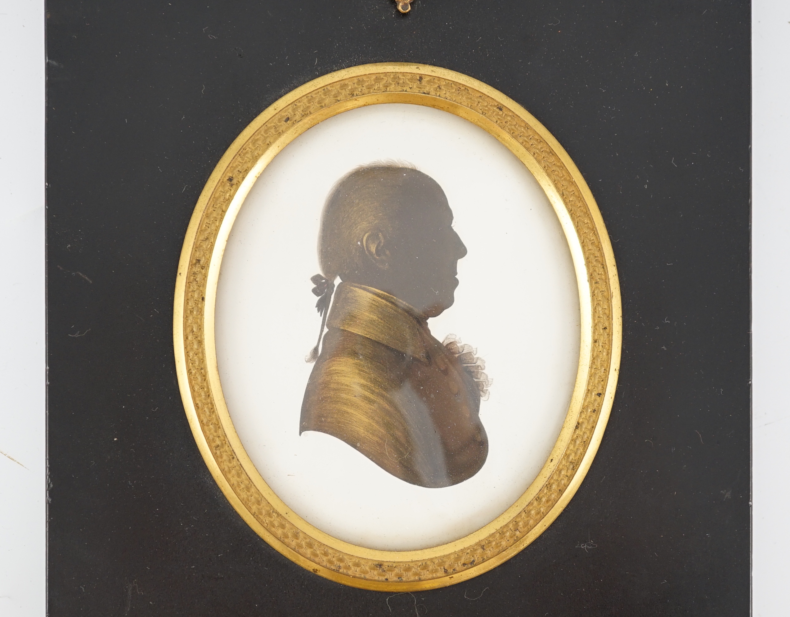 John Miers (1756-1821), Silhouette of a gentleman, painted and bronzed plaster, 8 x 6.5cm.